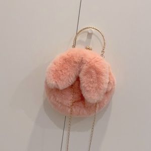 Fluffy 2-way pink circular bag with bunny ears